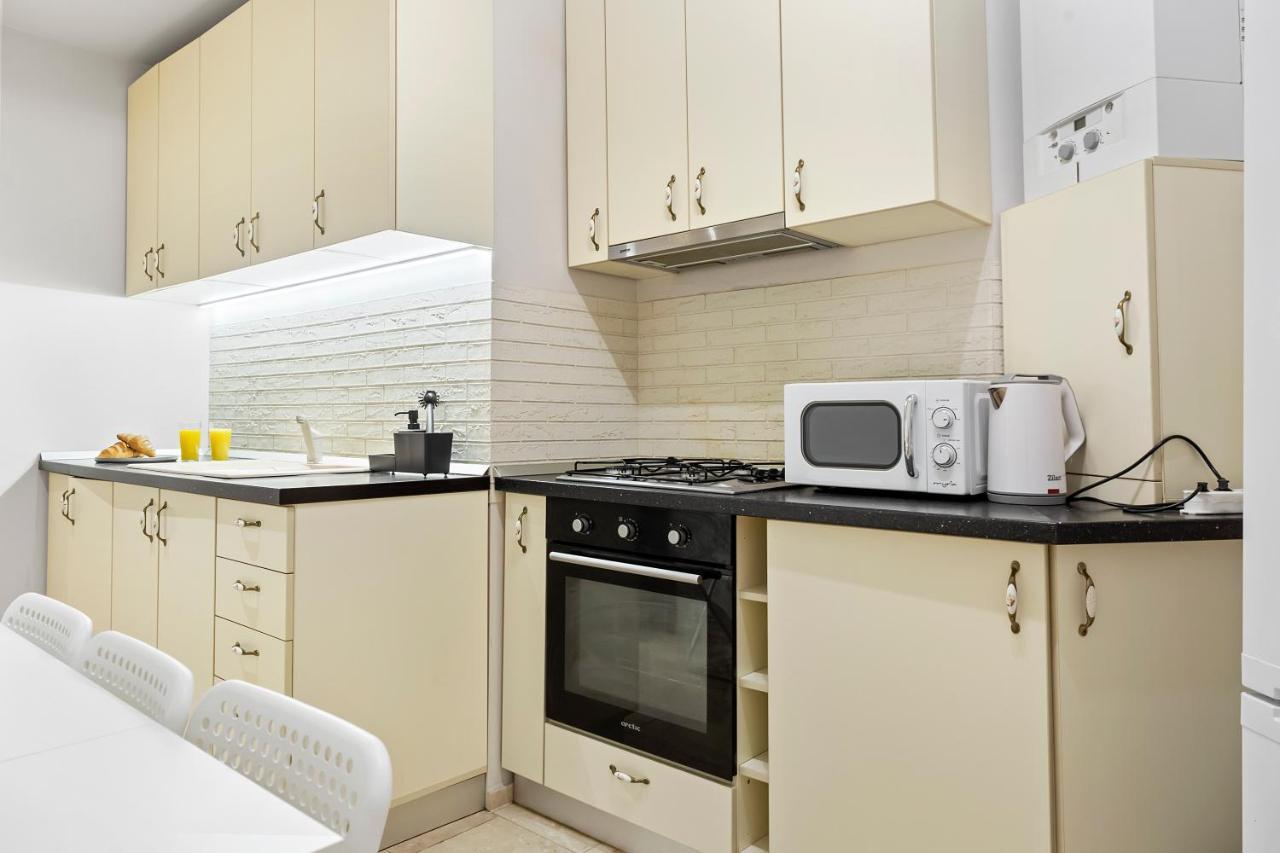 City Heart Retreat Elegant Apartment بوخارست المظهر الخارجي الصورة